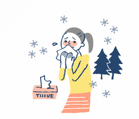 花粉症　鼻水をかむ女性