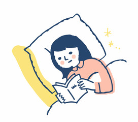 ベッドで本を読む女性