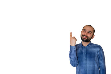 Naklejka premium Young Turkish man has an idea gesture, pointing with finger and looking up on isolated white background. Thoughtful guy solved a problem problem. Face expression, body language.