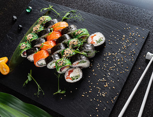 sushi on the black background