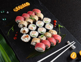 sushi on the black background