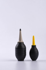 Two silicone blower for camera and lenses isolated on white background