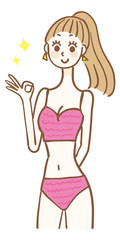 A woman in a swimsuit giving an OK sign