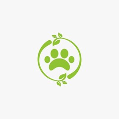Green leaf logo design. Bio natural sign vector. Circle foot print icon design. © DYNECREATIVE