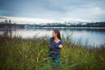 Naklejka na ściany i meble lifestyle portrait of young girl, posing outdoor