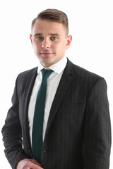 Handsome smiling man in suit and tie looking at camera portrait isolated background. White collar dress code, modern office lifestyle, graduate college study, profession idea, coach training concept