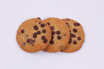 Top view of chocolate cookies isolated on a white background
