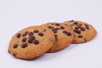 Top view of chocolate cookies isolated on a white background