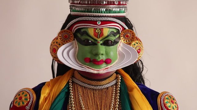 Close up of a Kathakali dancer doing eye expressions. 