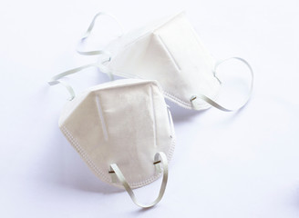 White n95 mask protect filter against air pollution (PM2.5) on white background