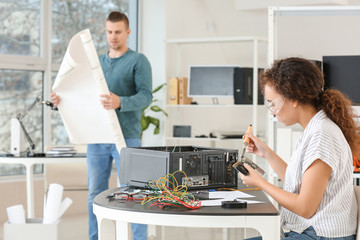 Electronic technicians working in service center