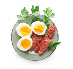 Fresh boiled eggs with bacon on white background