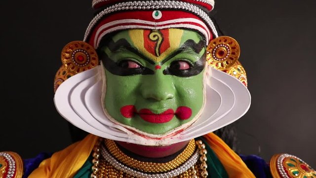 Kathakali dancer expressing through his gestures. 