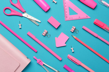 Set of school supplies on color background