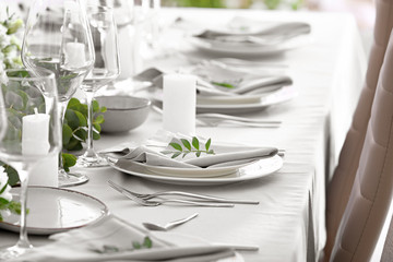 Beautiful table setting for wedding celebration in restaurant