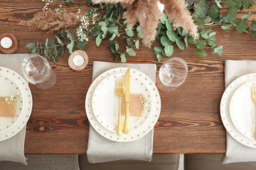 Beautiful table setting for wedding celebration in restaurant