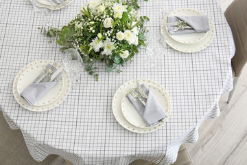 Beautiful table setting for wedding celebration in restaurant