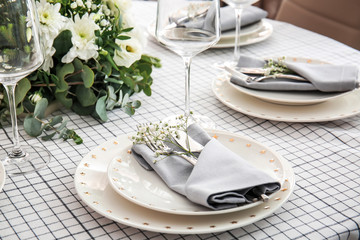 Beautiful table setting for wedding celebration in restaurant