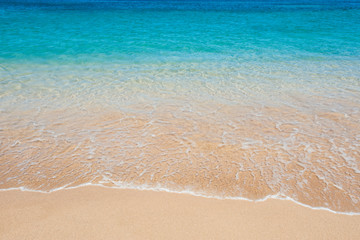 Fototapeta na wymiar Turquoise blue ocean water, ripple, waves, shinning