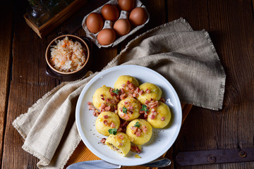 Polish dumplings with meat and mushroom sauerkraut filling