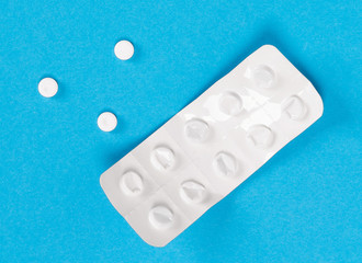 Pill strip on blue on background