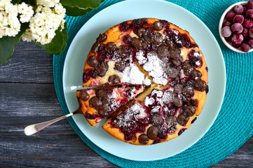 Cottage cheese pie with cherries and chocolate drops. The top view