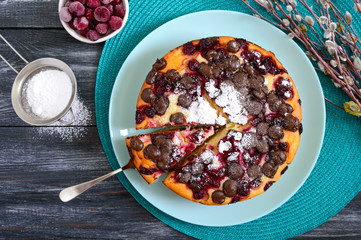 Cottage cheese pie with cherries and chocolate drops. The top view