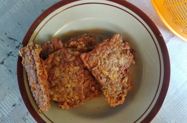 Tempe goreng or fried tempe. traditional indonesian culinary food. Indonesian Street Food.