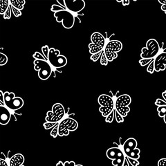Fototapeta na wymiar Seamless pattern with butterflies on black background. Hand drawn vector illustration.
