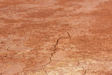 Flat red sand surface