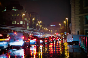 Fototapeta na wymiar busy traffic in the city on rainy night