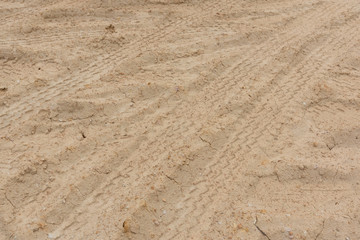Wheel tracks on dry dirt road