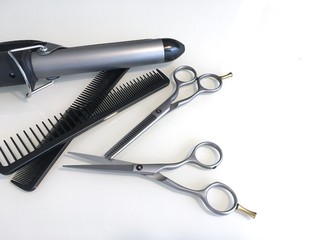 A set of tools for the work of a hairdresser. Background for the design of a beauty salon, website, barbershop.