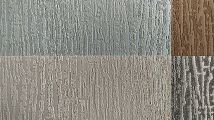 a photo of the pattern and texture of the gray wallpaper that adorns the walls