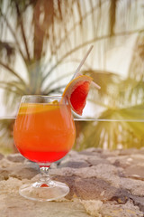 nice colorful cocktail posed by the pool