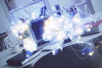 Multi exposure of business theme icons and work space with computer background. Concept of success.