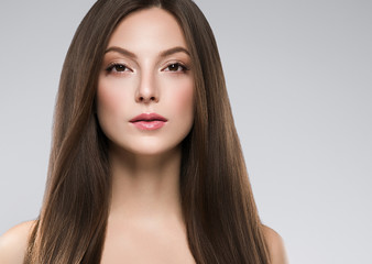 Fototapeta premium Woman face beauty healthy clean skin natural make up brunette hair close up female portrait