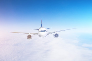 Fototapeta na wymiar Air travel on a passenger plane flying in the sky.