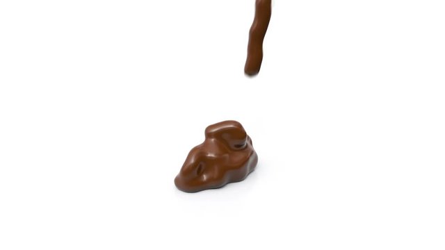 falling viscous chocolate on white background