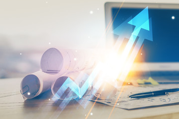 Computer on desktop with point up arrows hologram. Double exposure. Concept of success.