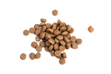 Dry cat food isolated on white background close-up top view