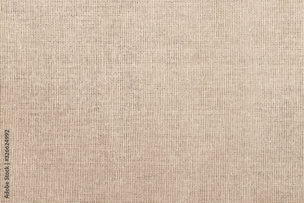 Wall mural brown cotton fabric texture background, seamless pattern of natural textile.