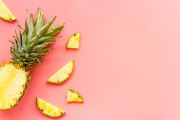 Pineapple - half of fruit and slices - on pink background top-down copy space - Powered by Adobe