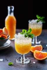 Cocktail with oranges