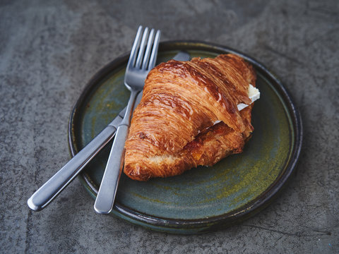Croissant with brie cheese and jam