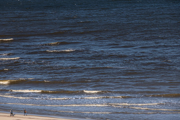 calm landscape of the beach on the Polish Baltic Sea on a cloudy February day