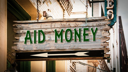 Fototapeta premium Street Sign to Aid Money