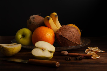 Dramatic still life of assorted fruits zest