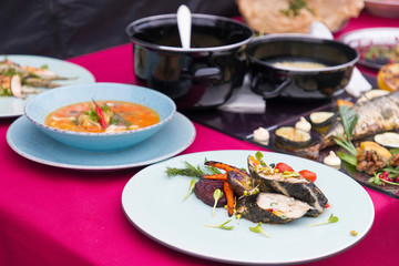 fish dishes stacked on the table