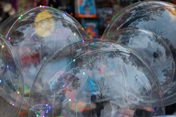 Fototapeta na wymiar large, gleaming, colorful, transparent bubbles